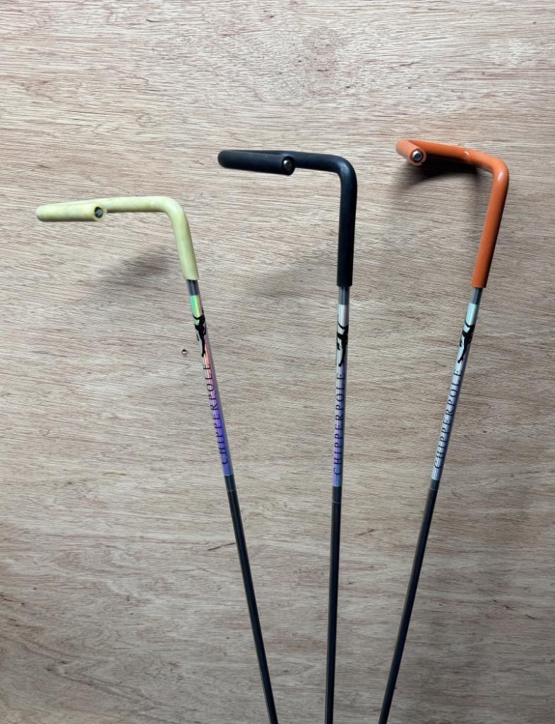 ChipperPole in all three colors — cream, black, and rust